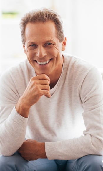 A mature man with a great smile, smiling